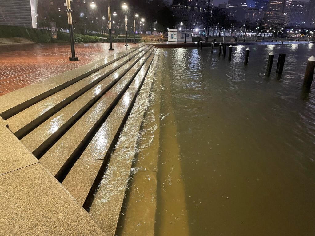 a wet road with a bridge (MyCoast AI)