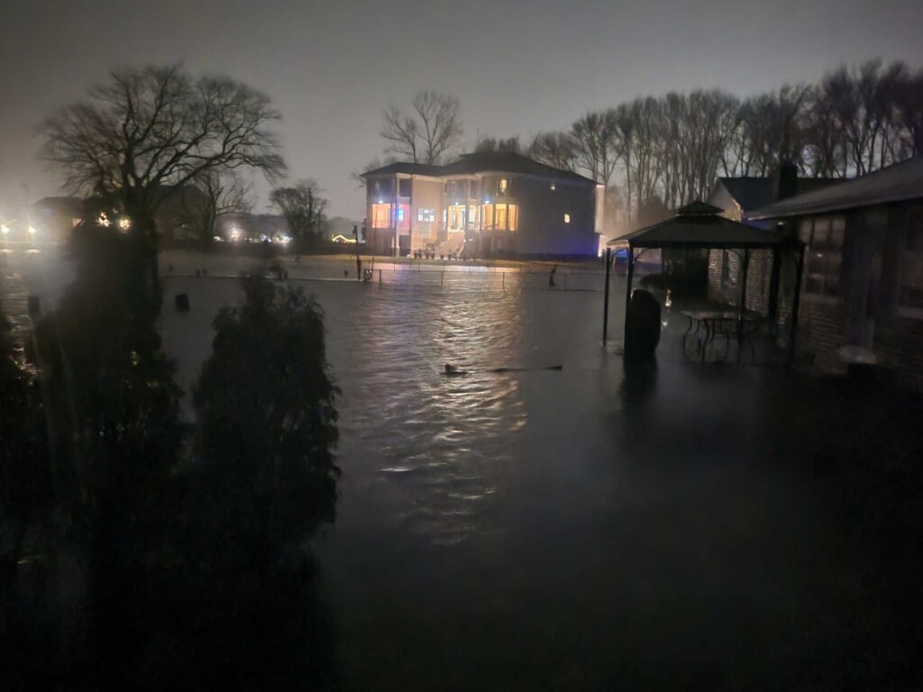 a flooded area with buildings and trees (MyCoast AI)