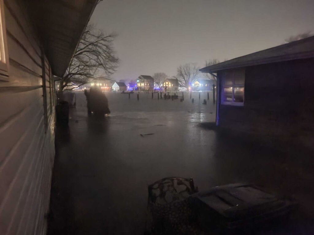 a snowy parking lot at night (MyCoast AI)