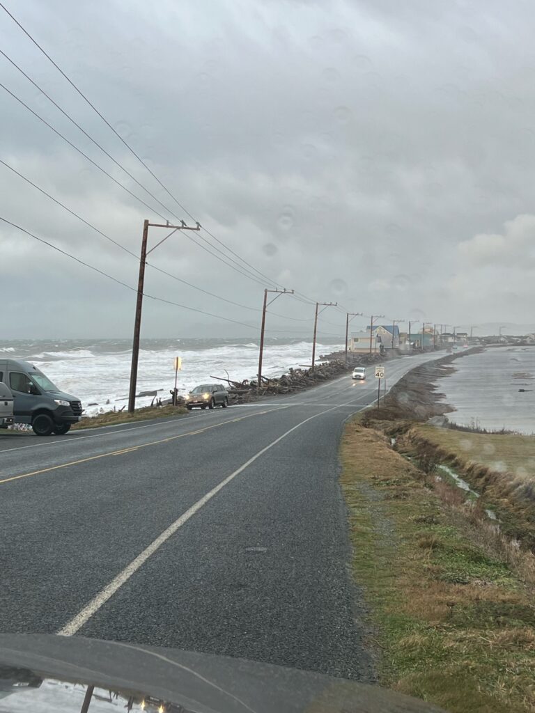 cars on a road by water (MyCoast AI)