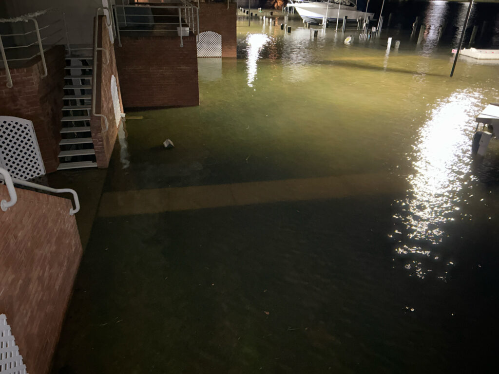 a flooded area with ladders (MyCoast AI)