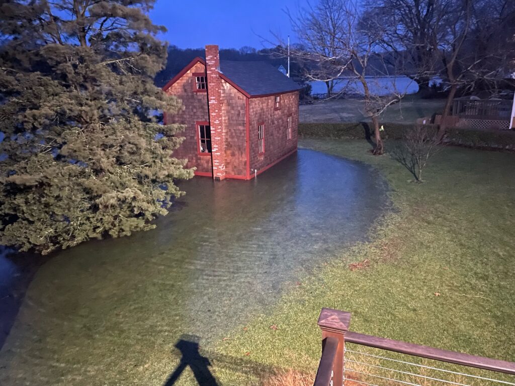 a small building next to a river (MyCoast AI)