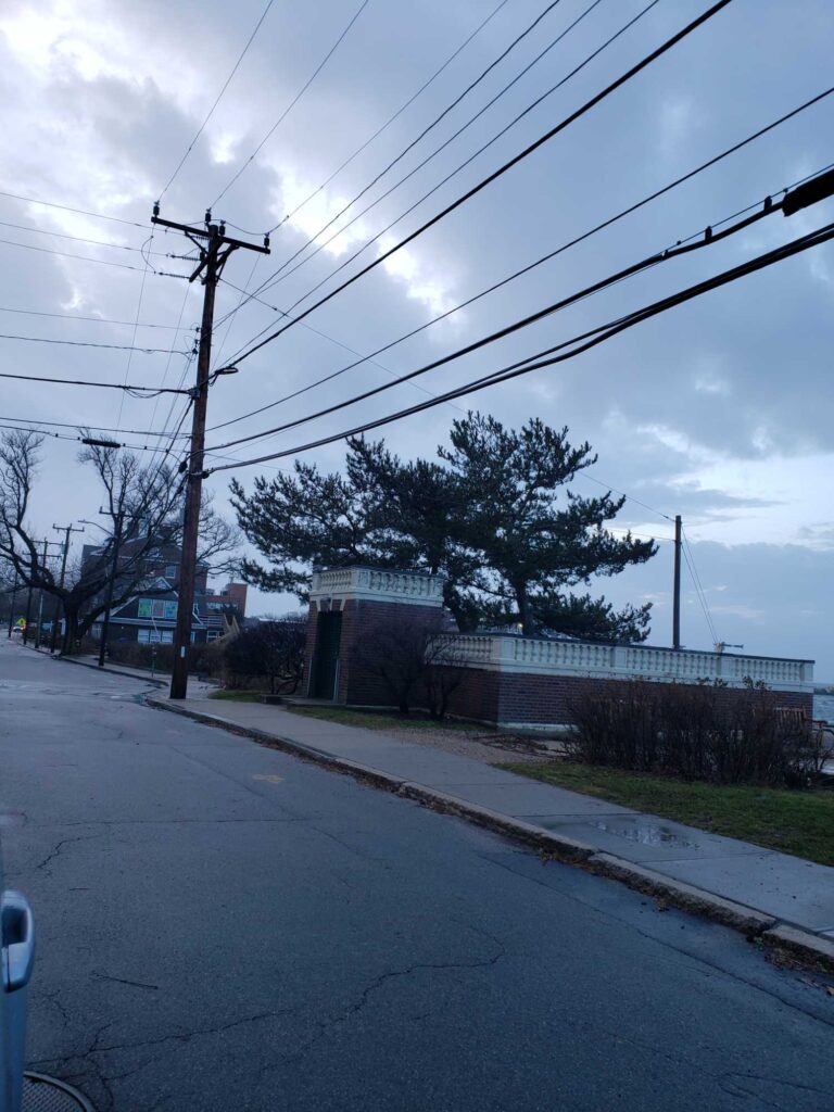 a road with power lines and trees (MyCoast AI)