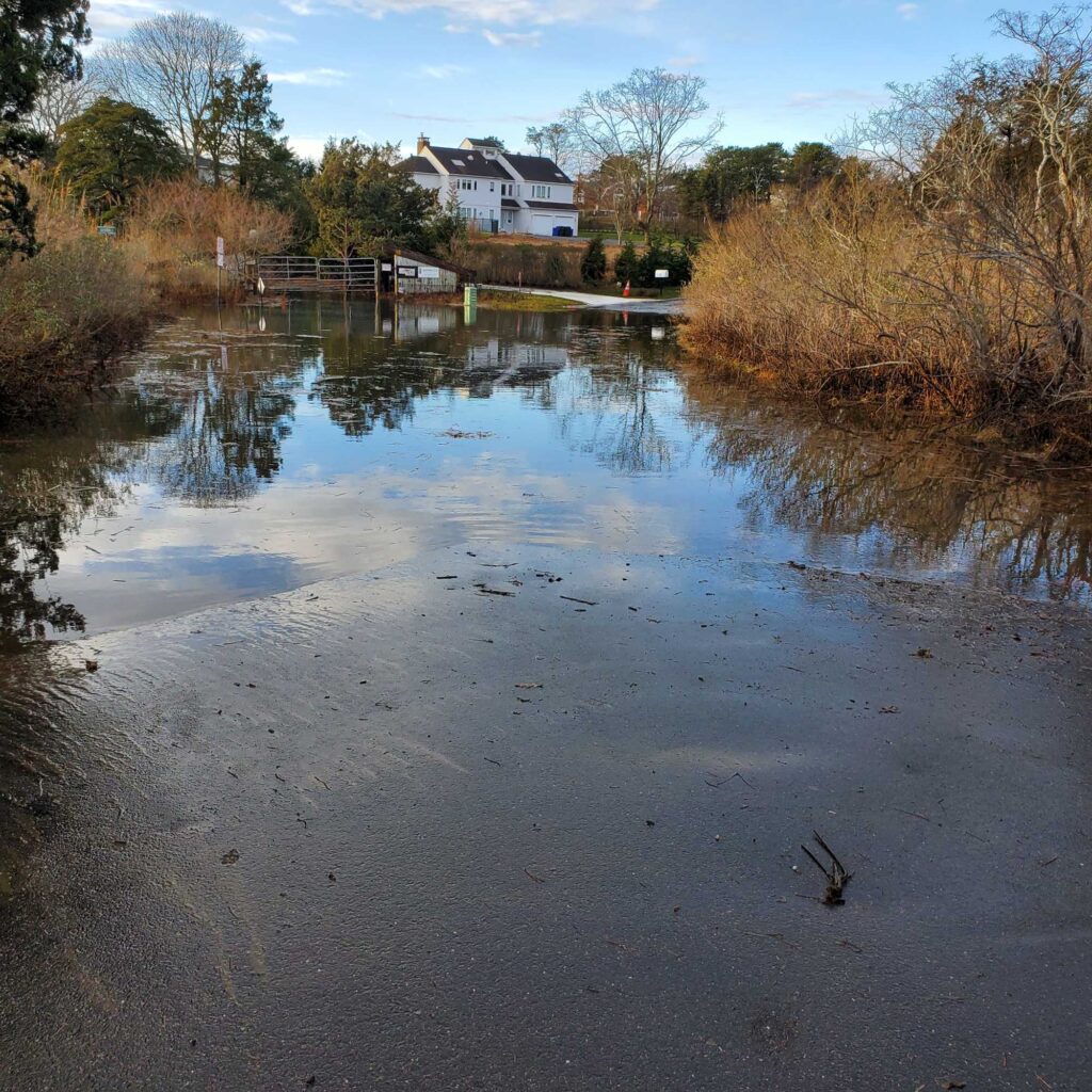 a body of water with a house in the background (MyCoast AI)