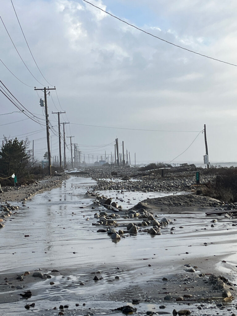 a road with power lines on the side (MyCoast AI)