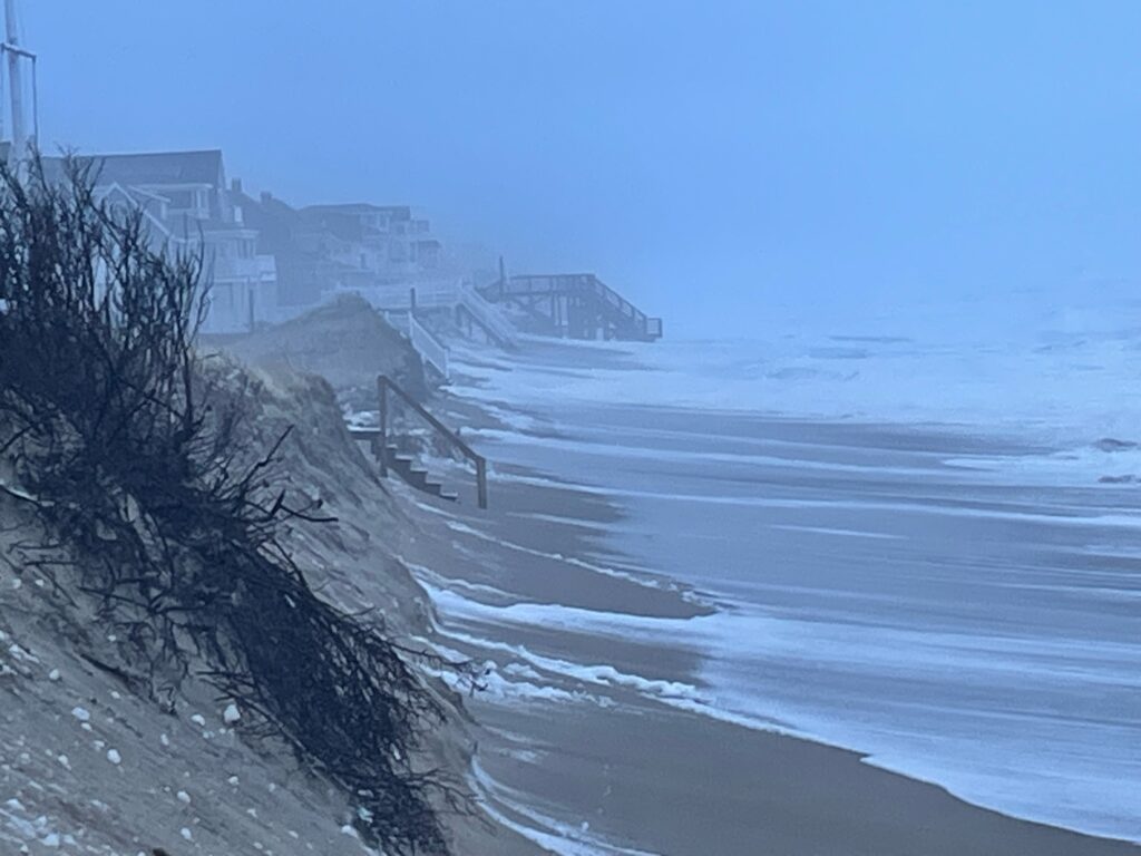 a snowy beach with a bridge (MyCoast AI)