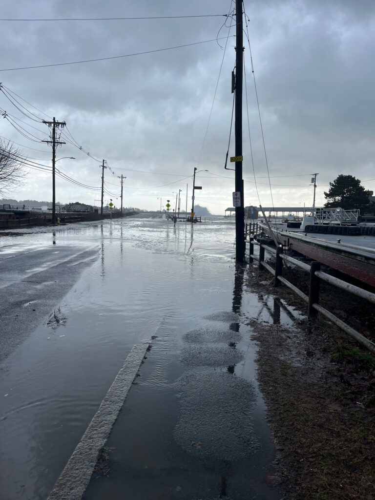 a flooded area with a boat in it (MyCoast AI)
