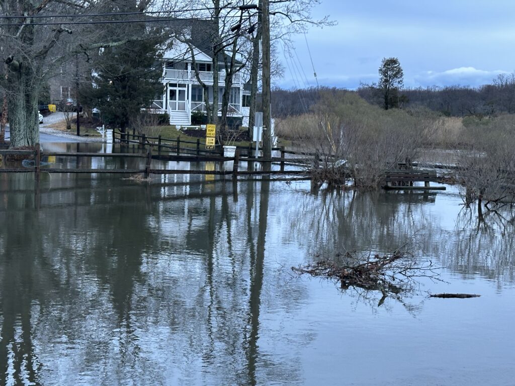 a body of water with a house in the background (MyCoast AI)