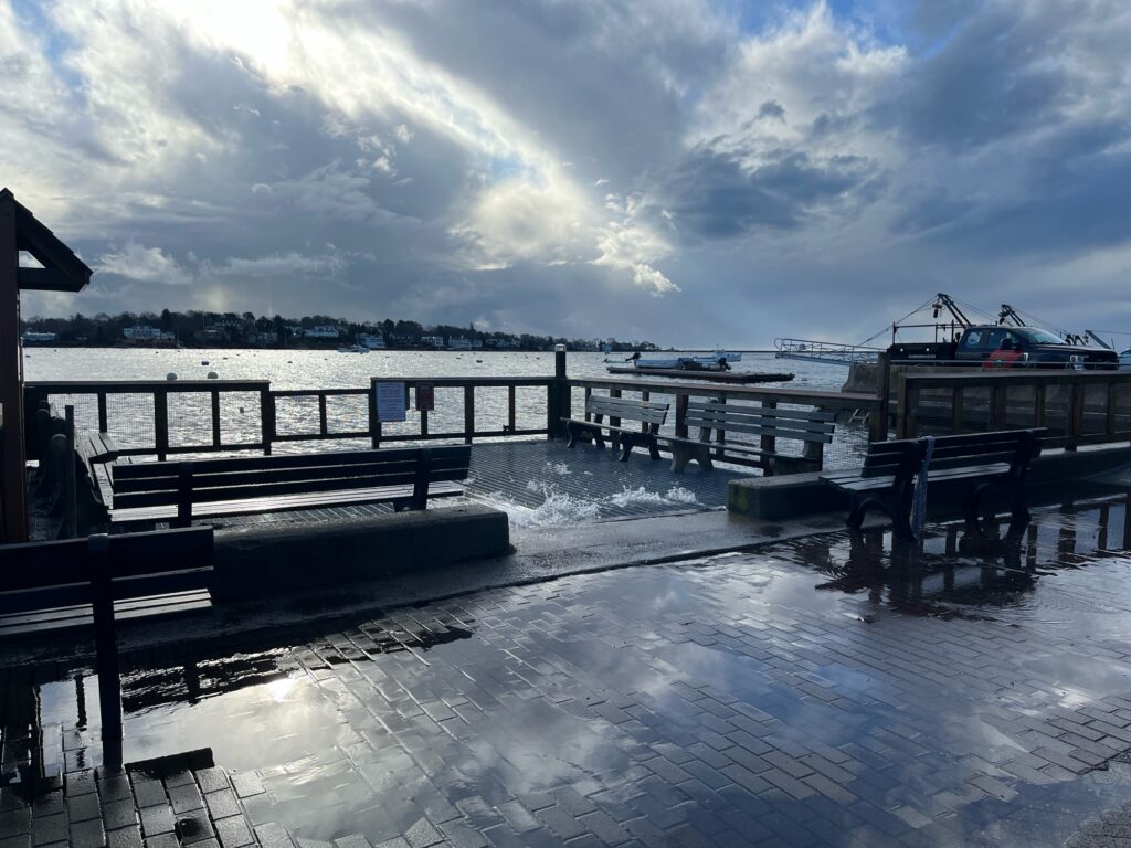 a dock with benches and a boat (MyCoast AI)