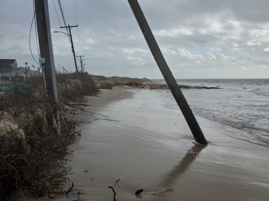 a beach with a metal pole (MyCoast AI)