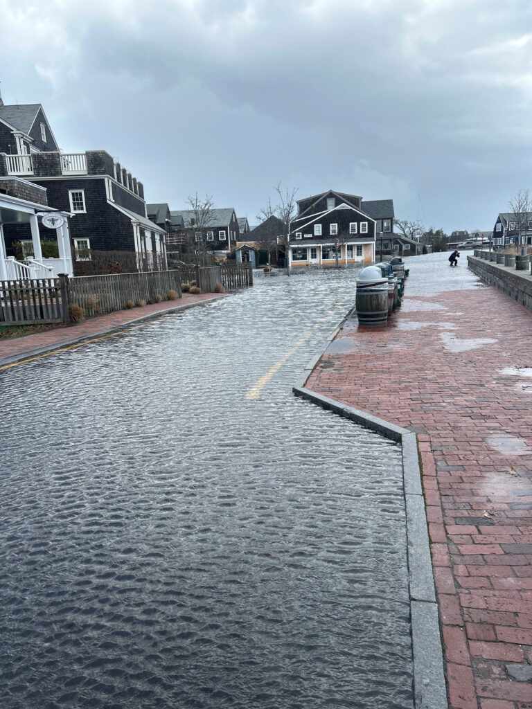a brick road with buildings on either side of it (MyCoast AI)