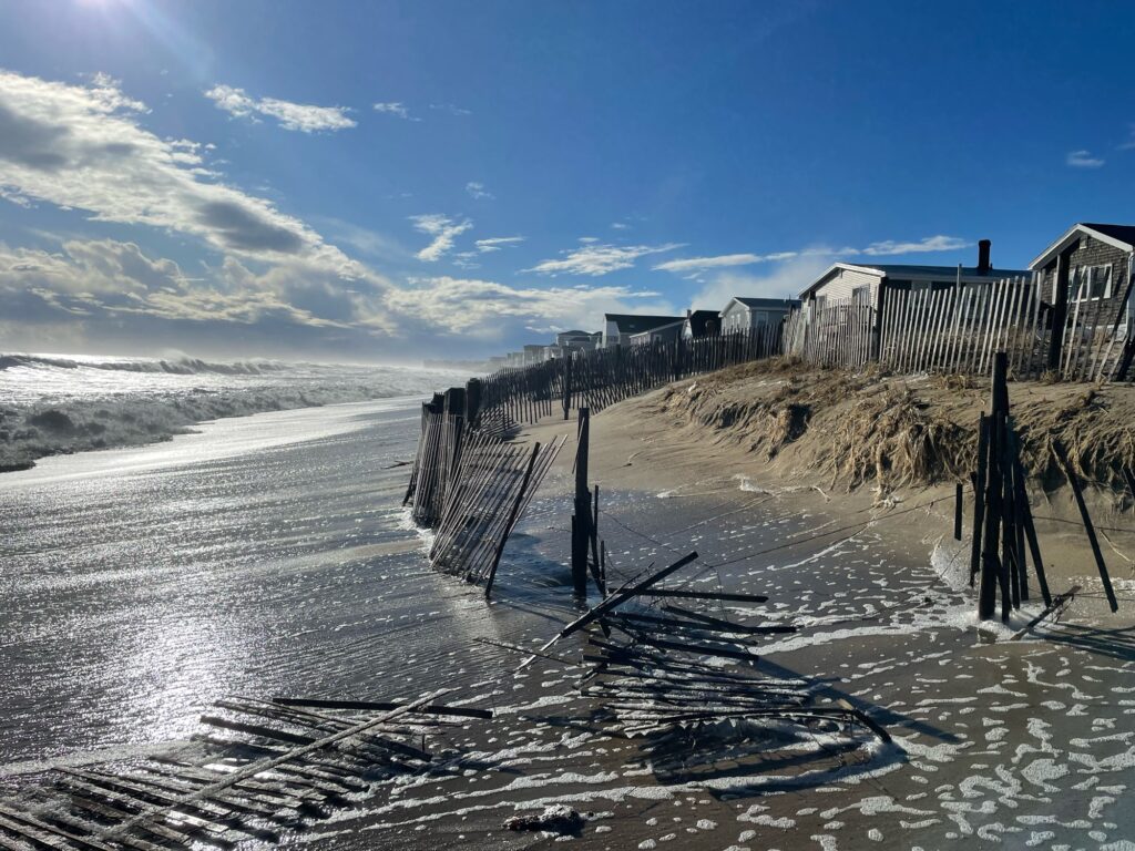 a beach with a row of houses (MyCoast AI)