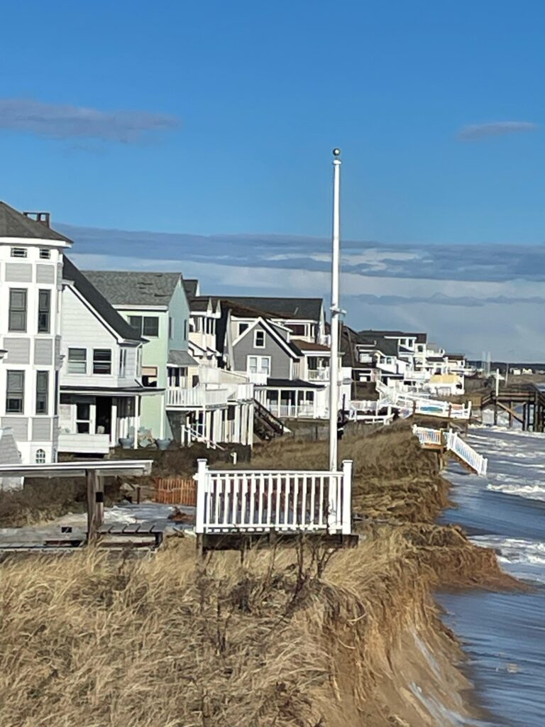 a row of houses on a beach (MyCoast AI)