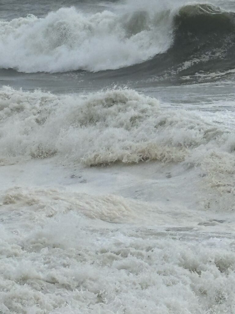 waves crashing on a beach (MyCoast AI)