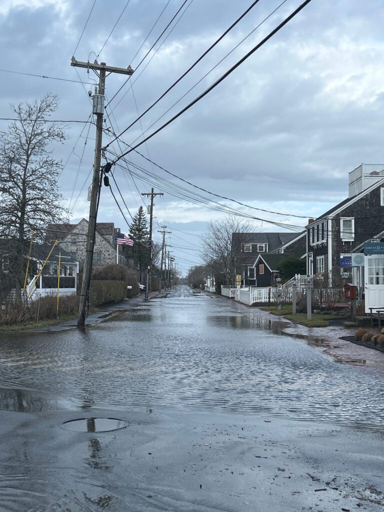 a flooded street with power lines (MyCoast AI)