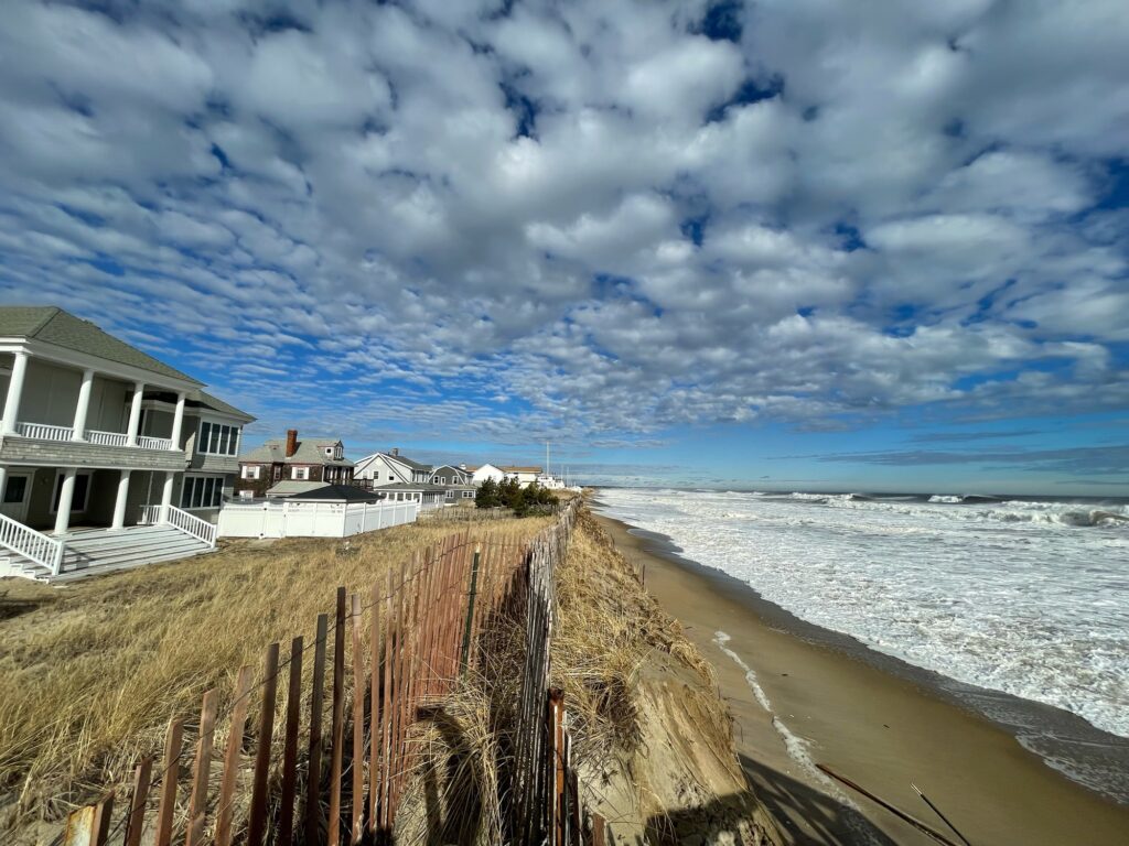 a beach with houses along it (MyCoast AI)