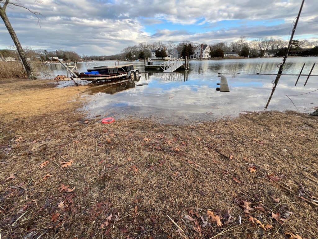 a lake with boats and a dock (MyCoast AI)