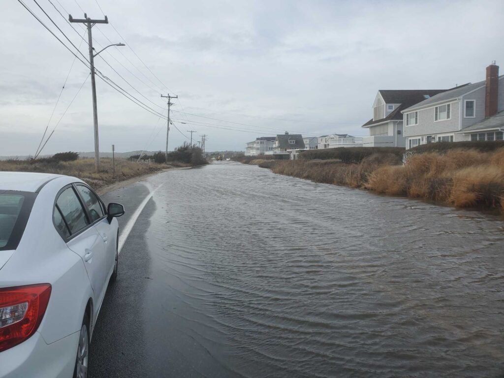 a car driving on a flooded road (MyCoast AI)