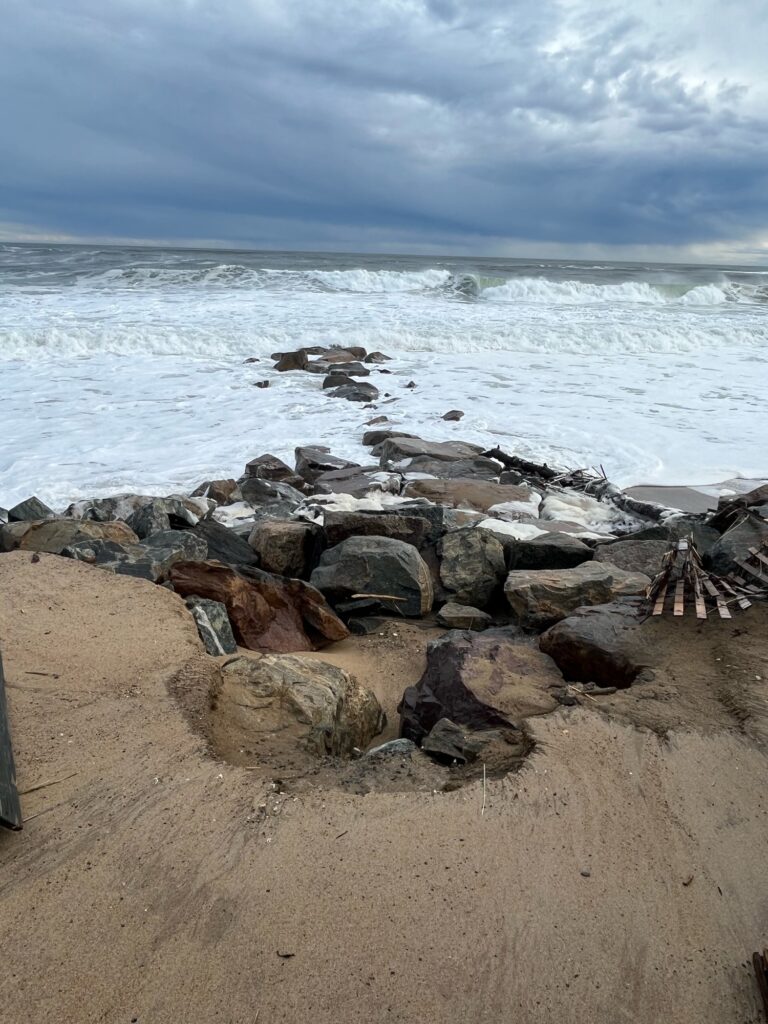 a rocky beach with waves crashing (MyCoast AI)