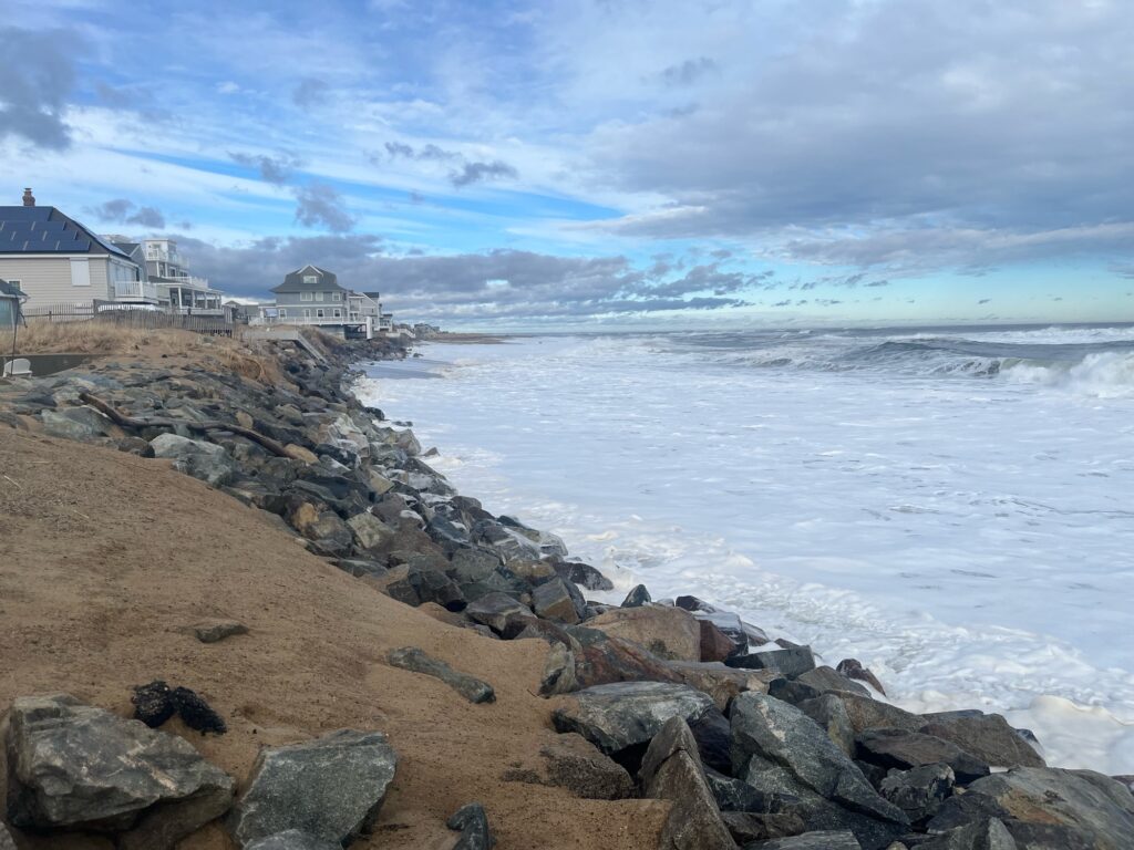 a rocky beach with waves crashing (MyCoast AI)
