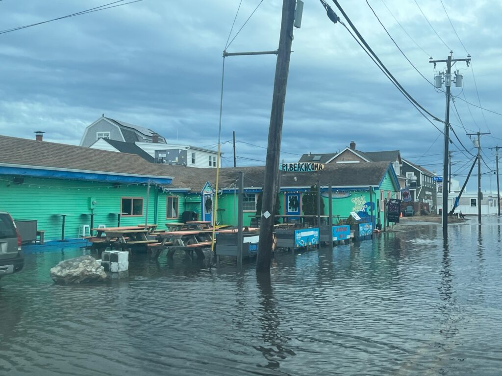 a row of houses on the water (MyCoast AI)