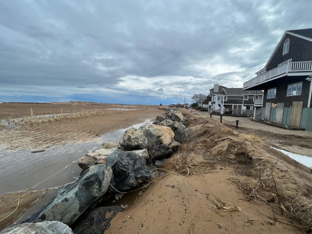 a rocky beach with houses (MyCoast AI)