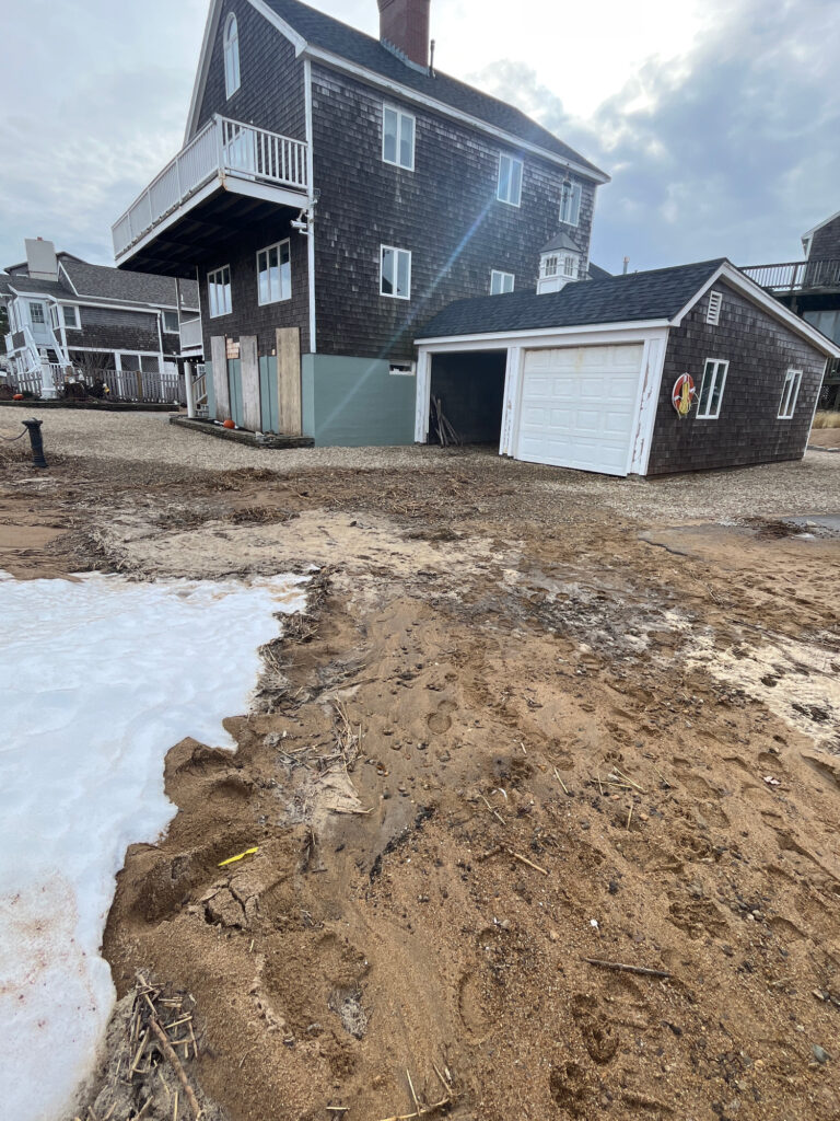 a pile of dirt in front of a house (MyCoast AI)