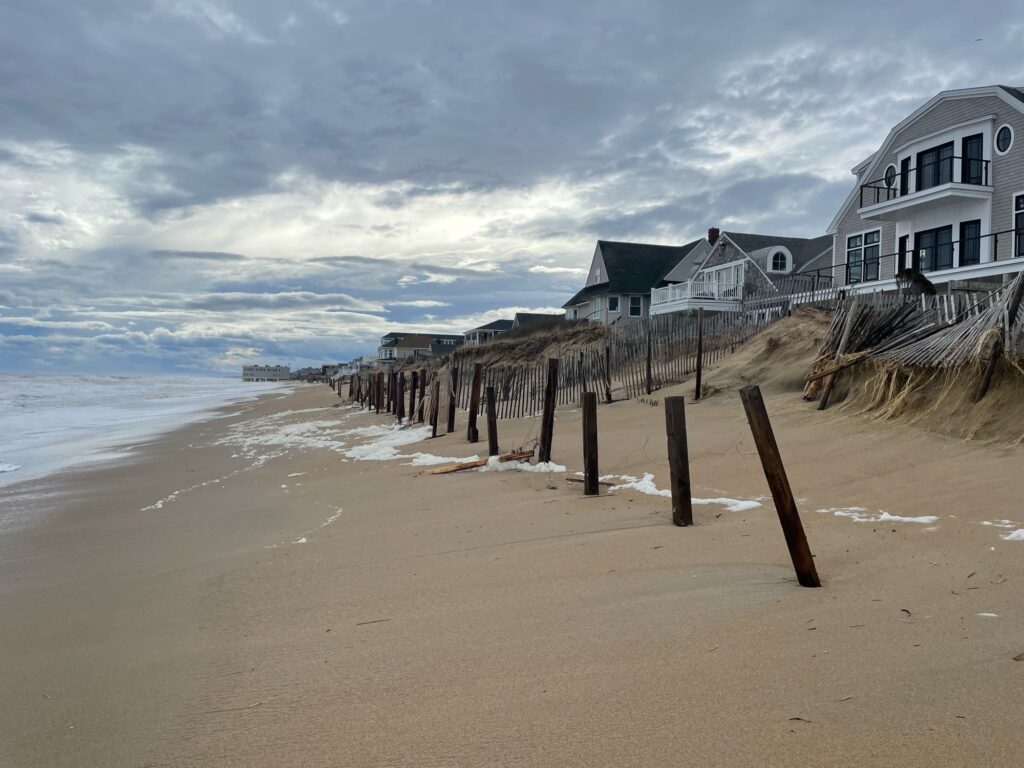a beach with a house on the shore (MyCoast AI)