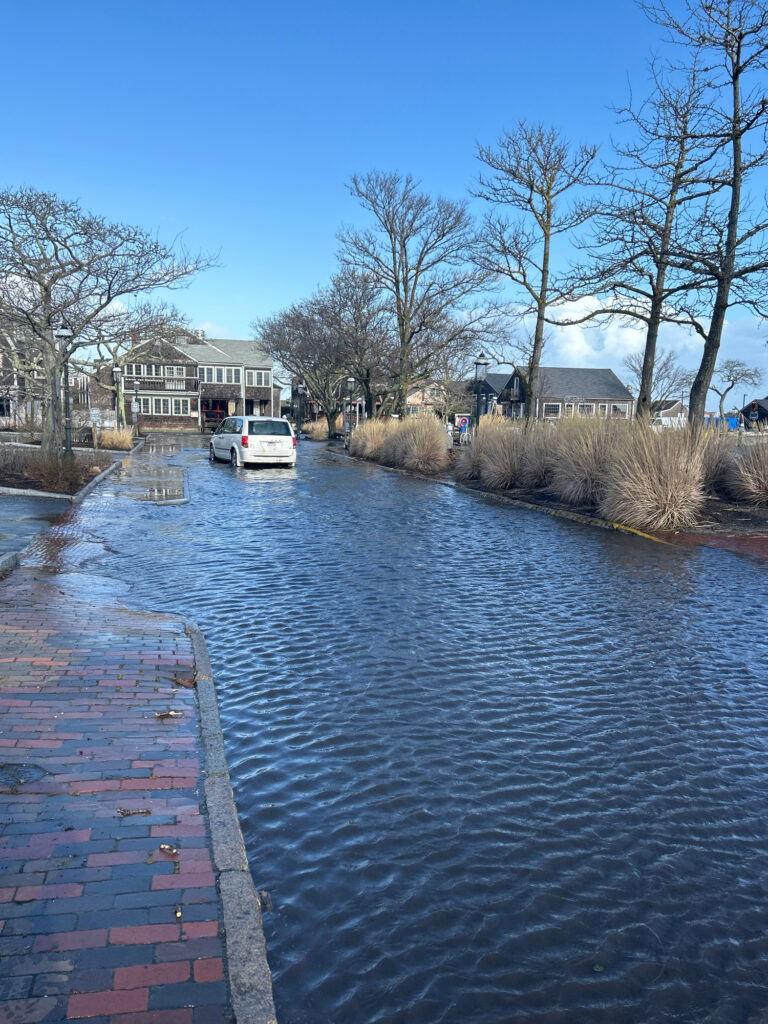 a brick walkway next to a river (MyCoast AI)