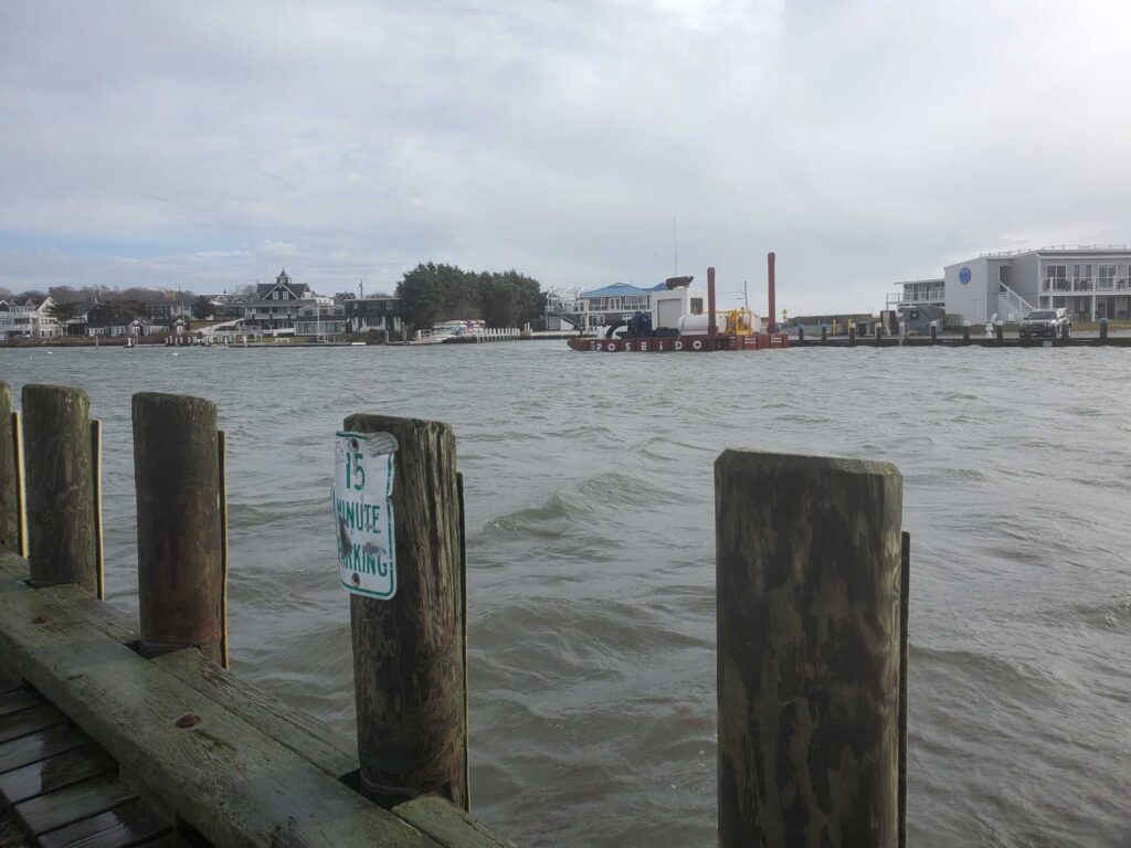 a dock with a sign on it (MyCoast AI)