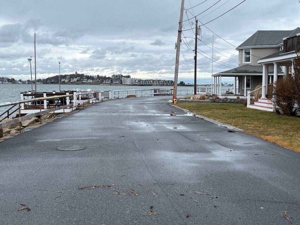 a road next to a body of water (MyCoast AI)
