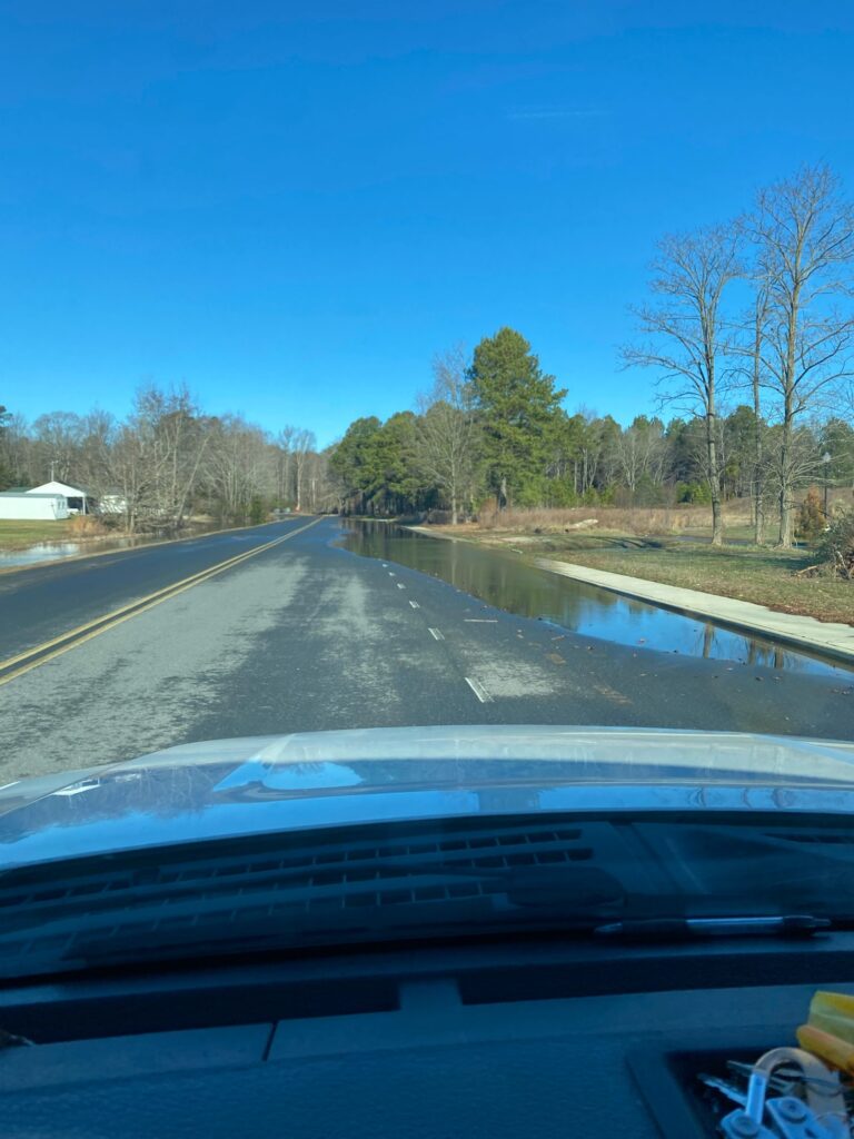 a road with water on the side (MyCoast AI)