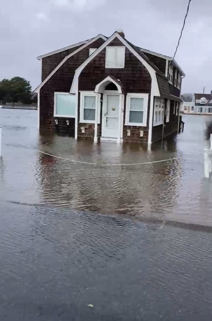 a house on a flooded street (MyCoast AI)