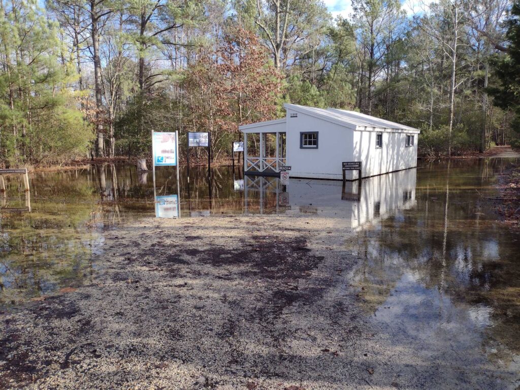 a small house in a flooded area (MyCoast AI)