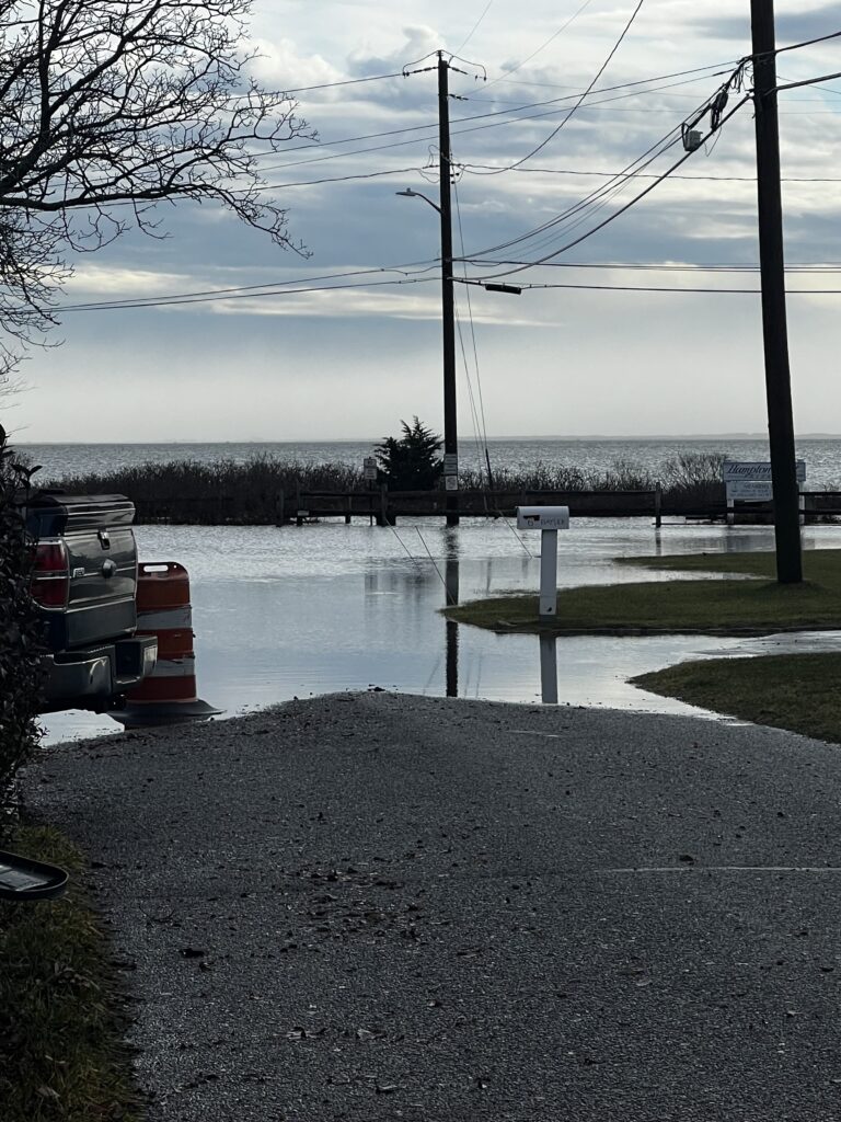 a flooded street with power lines (MyCoast AI)