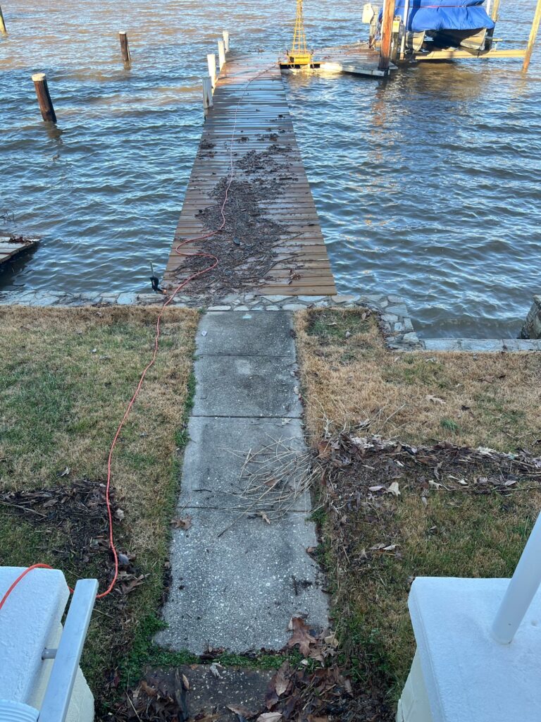 a concrete walkway over water (MyCoast AI)