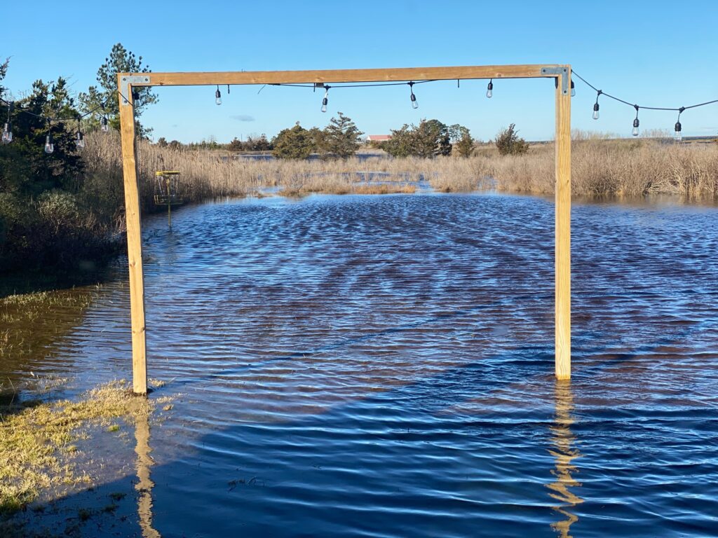 a wooden bridge over a body of water (MyCoast AI)