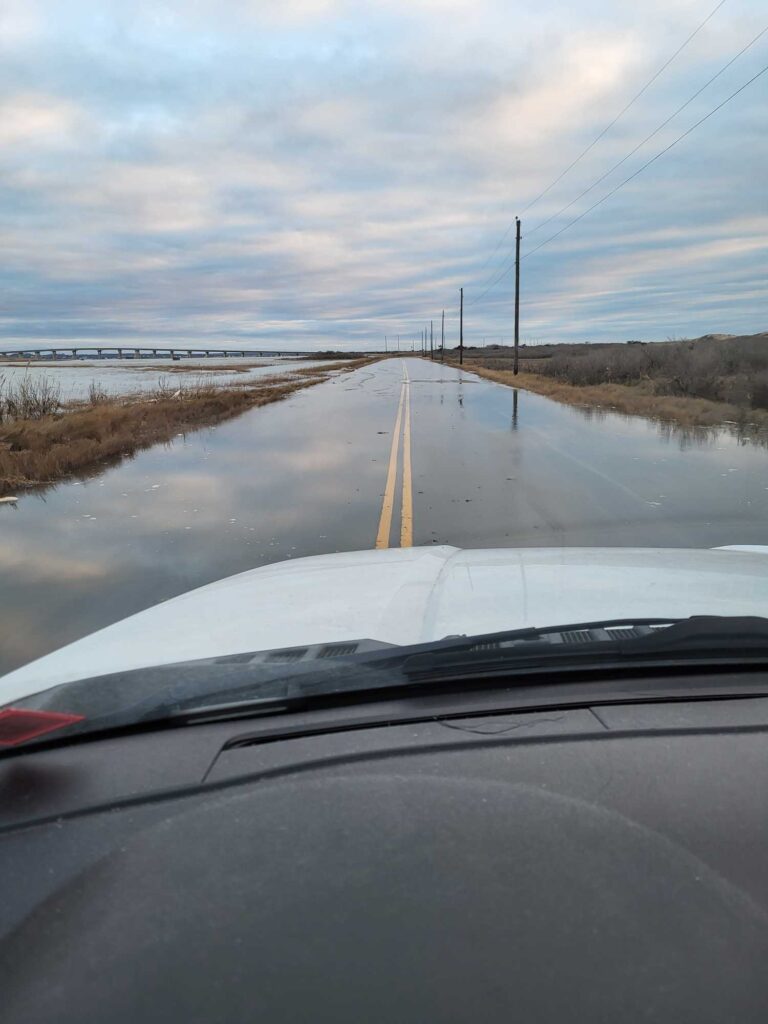 a road with water on the side (MyCoast AI)
