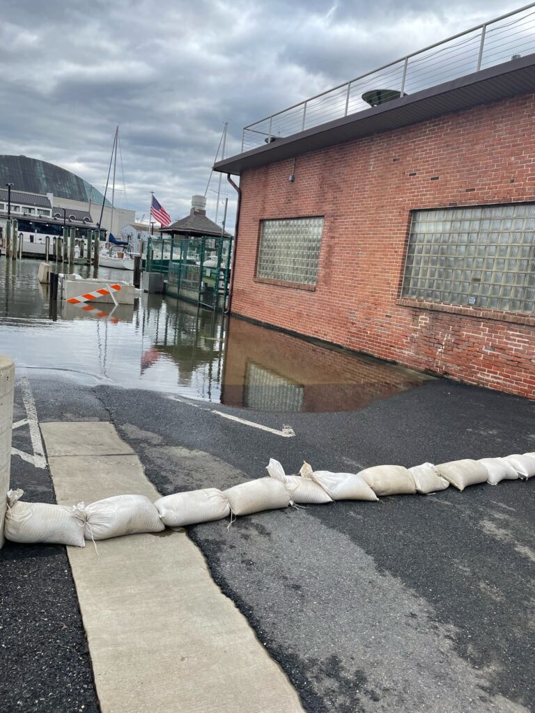 a building with a puddle of water (MyCoast AI)