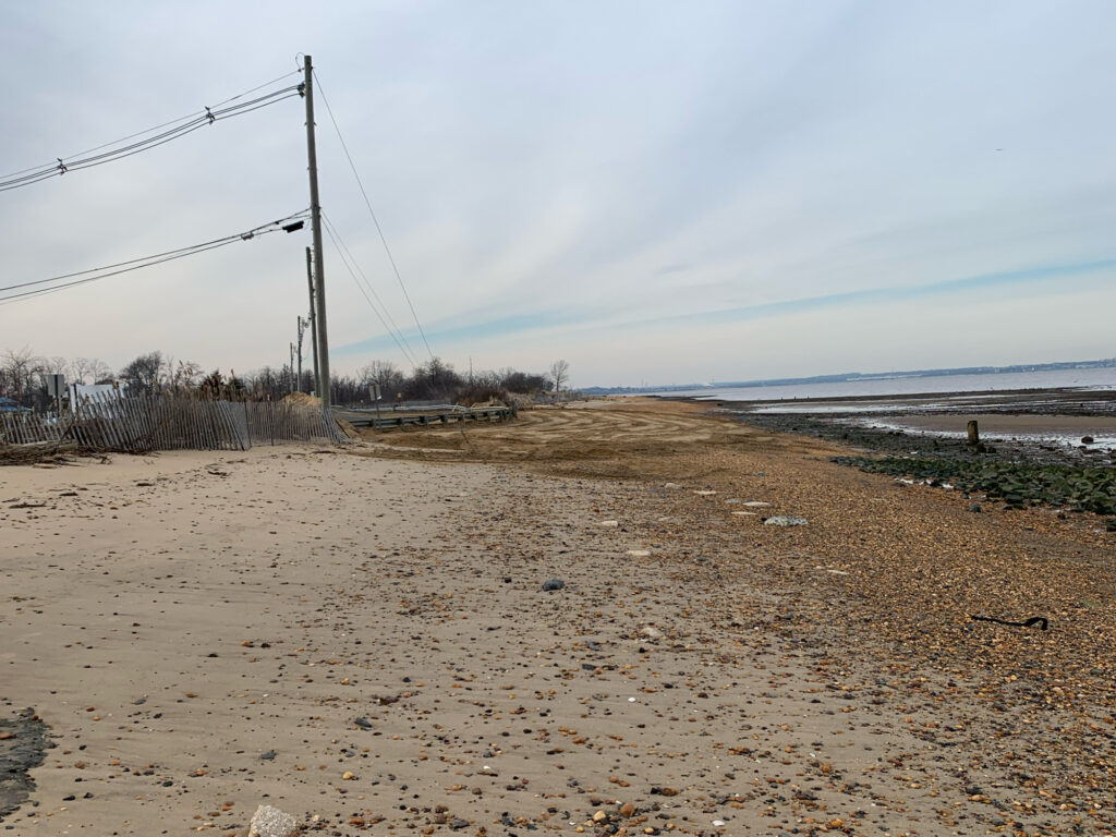 a sandy beach with power lines (MyCoast AI)
