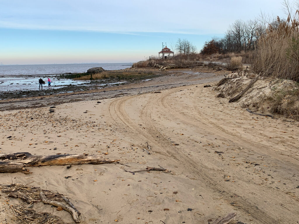 a sandy beach with a house on it (MyCoast AI)