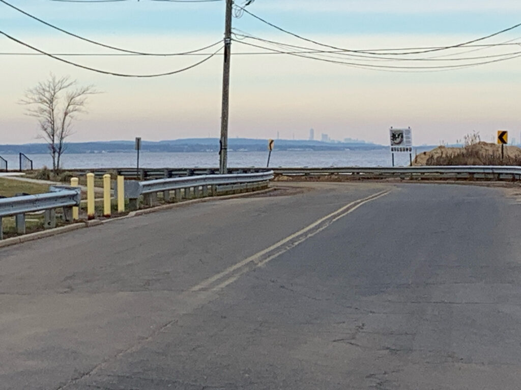 a road with a sign on it (MyCoast AI)