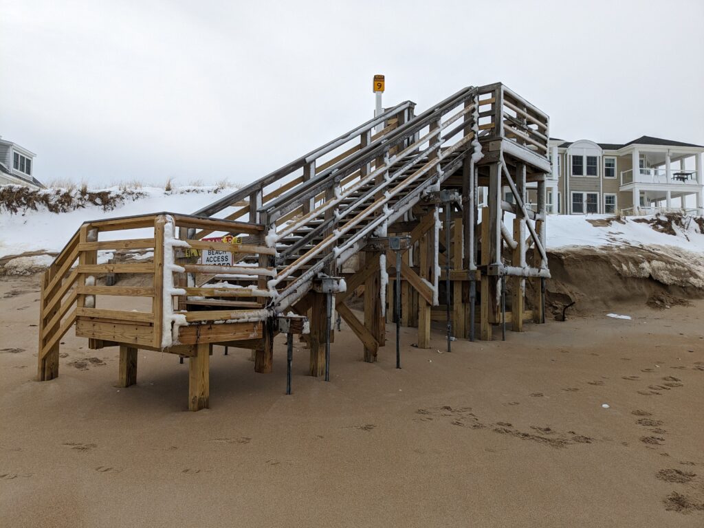 a wooden structure on a beach (MyCoast AI)
