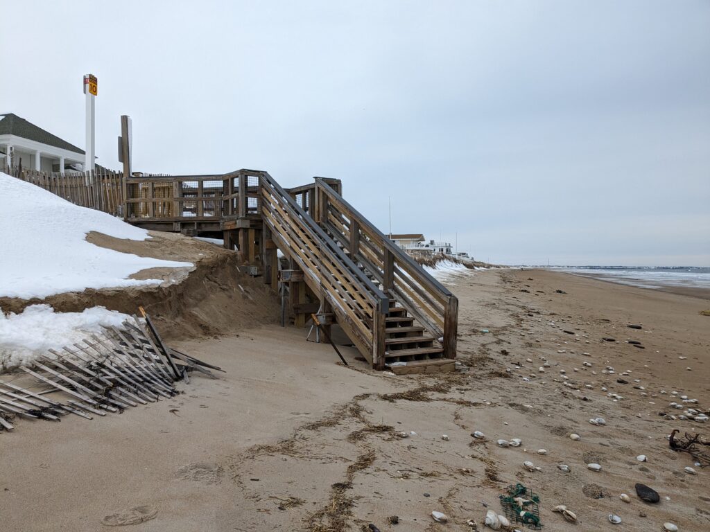 a wooden staircase on a beach (MyCoast AI)
