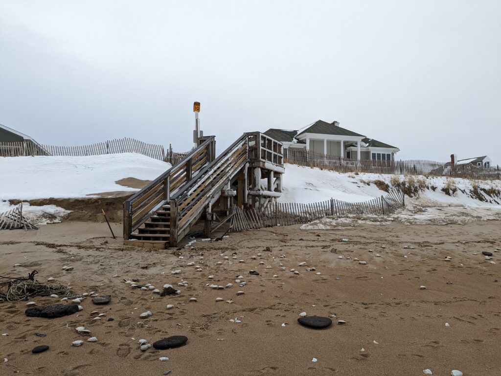 a wooden staircase in a snowy area (MyCoast AI)