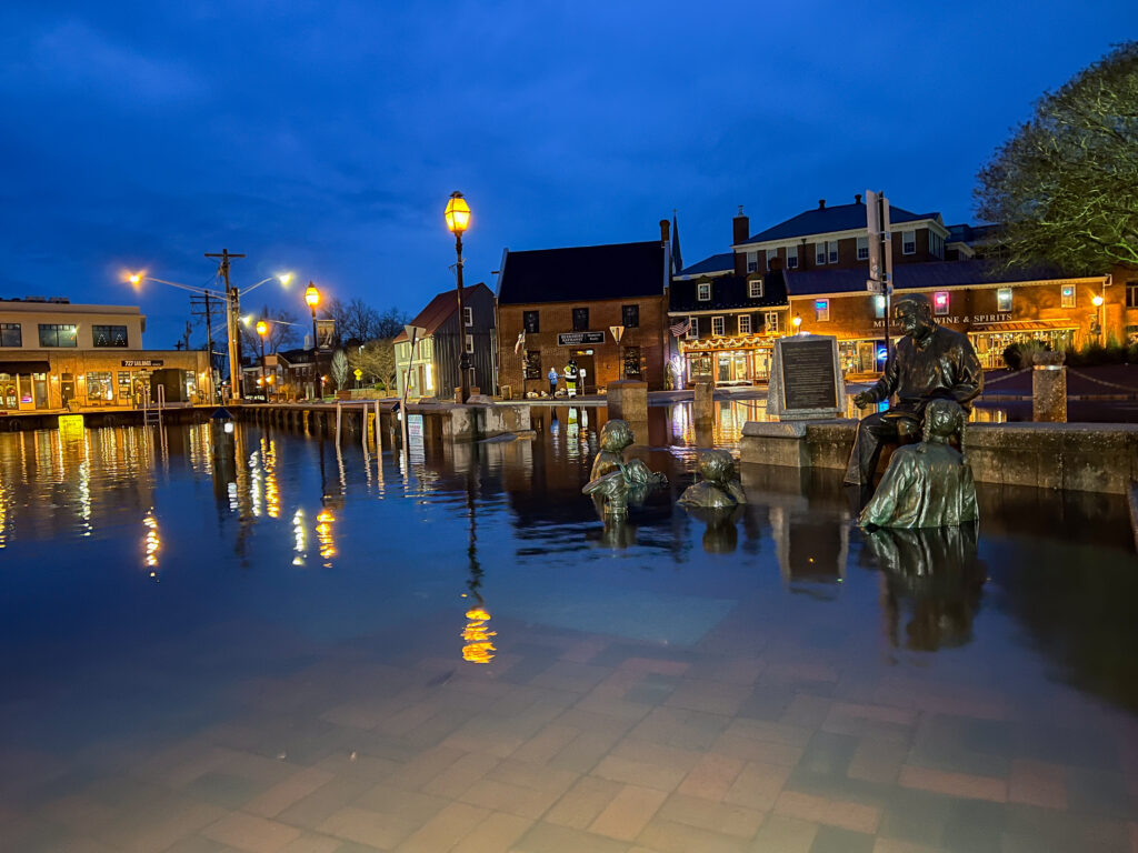 a body of water with statues in it and buildings around it (MyCoast AI)
