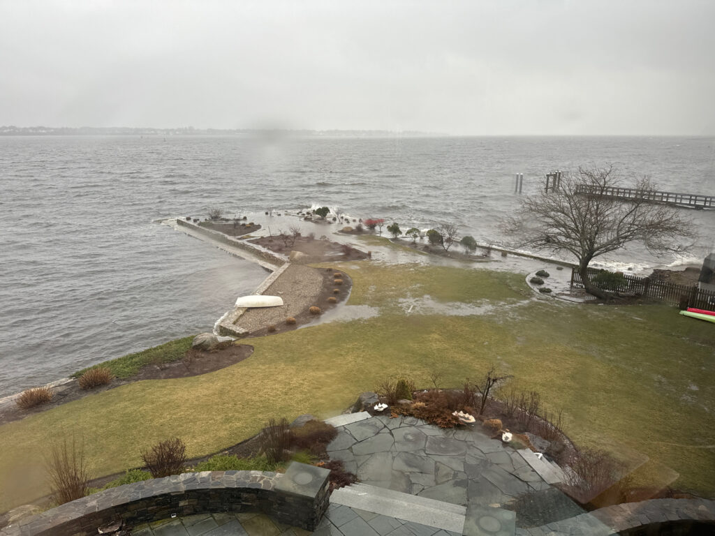 a body of water with a road and buildings by it (MyCoast AI)