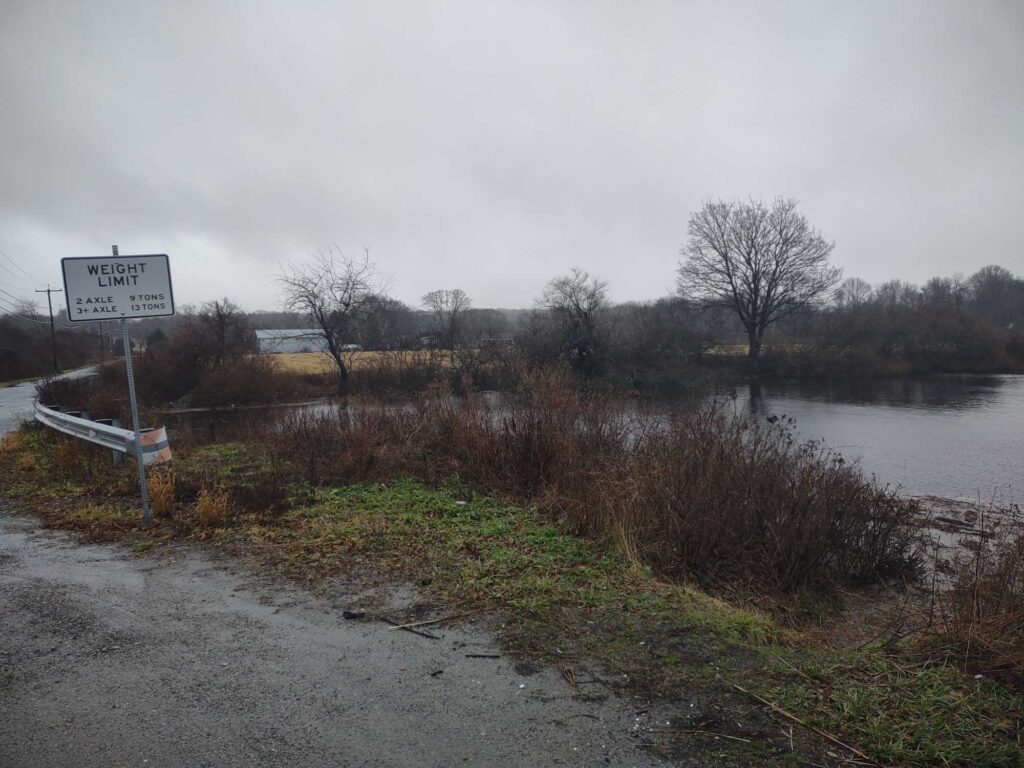 a river with a sign (MyCoast AI)