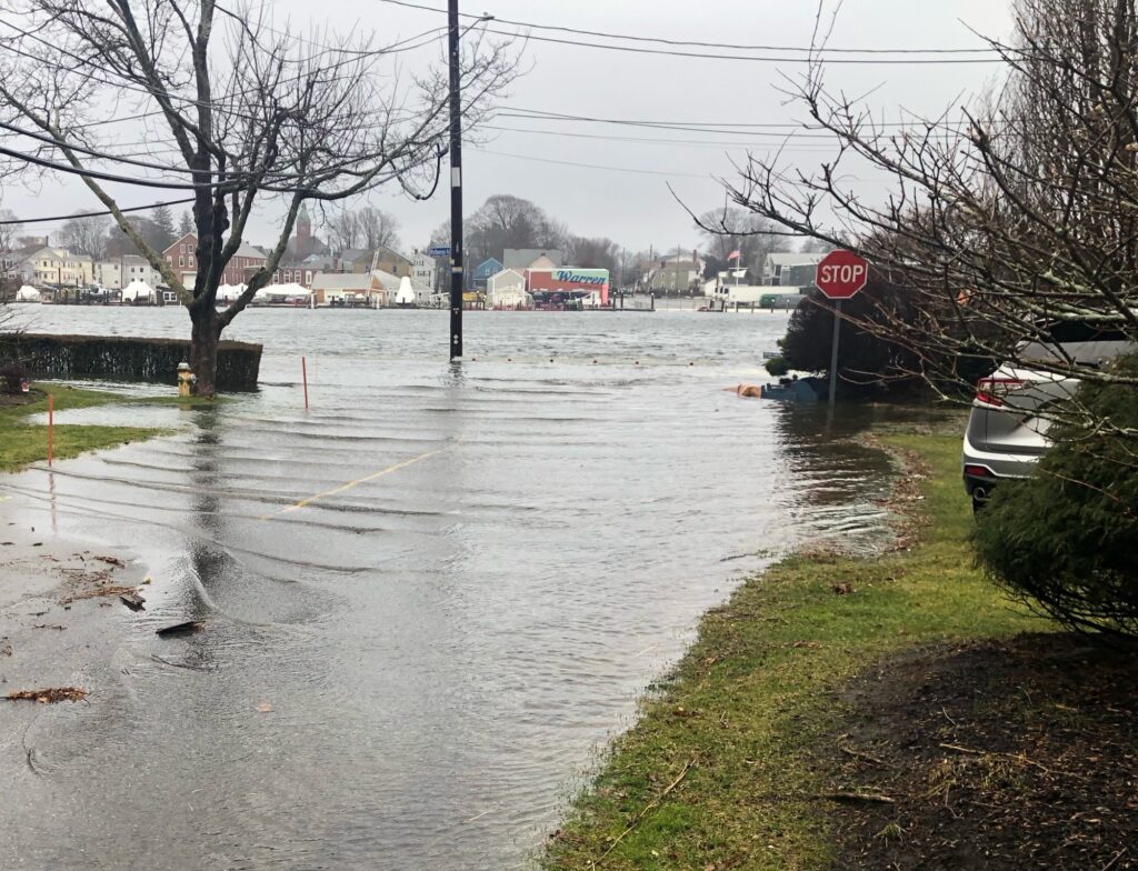a flooded street with a stop sign (MyCoast AI)