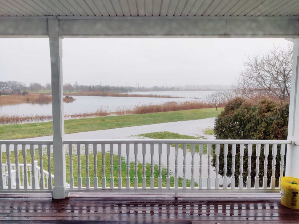 a view of a river through a window (MyCoast AI)